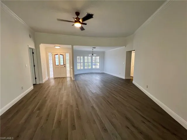 Formal Living room with crown molding.