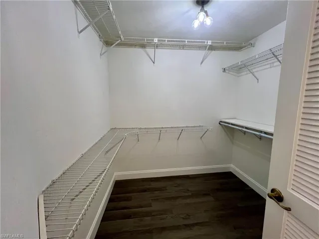Spacious walk in closet.