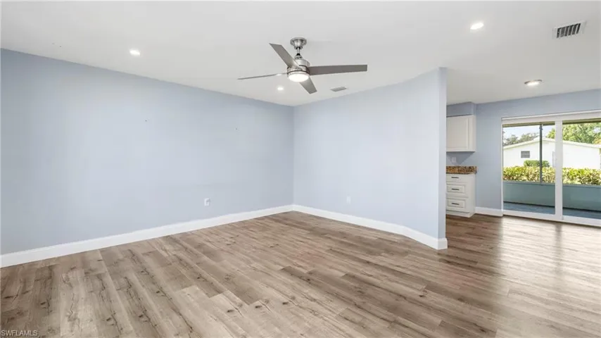 Unfurnished room with a ceiling fan, light wood-style flooring, and recessed lighting