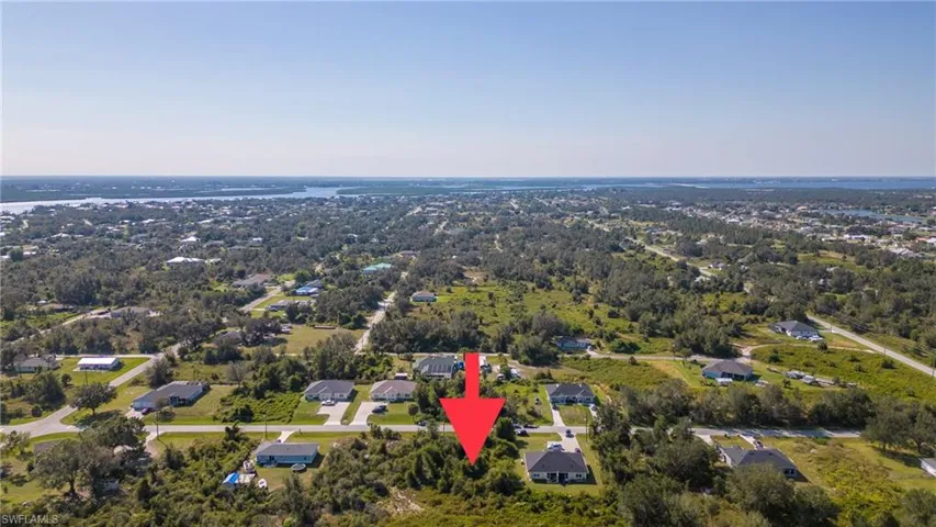 View of property location featuring nearby suburban area
