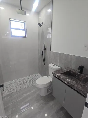 1421  Clark  AVE, Lehigh Acres, FL 33972