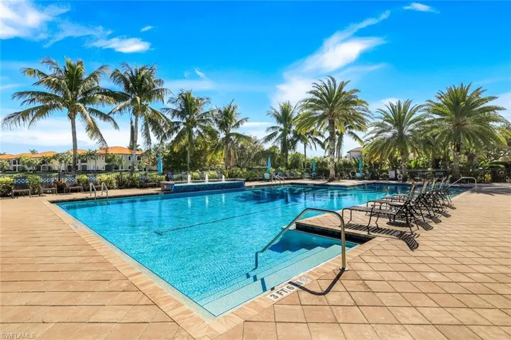 Community pool featuring a patio area