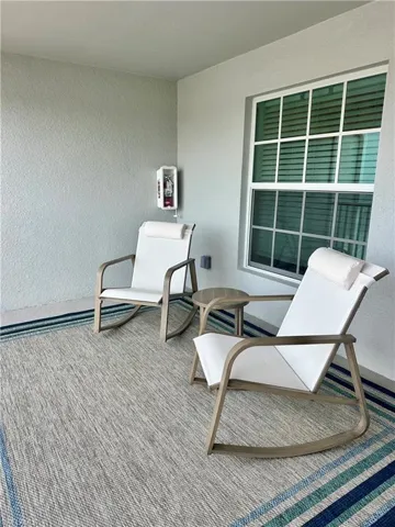 View of patio / terrace with a balcony