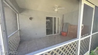 View of patio featuring ceiling fan