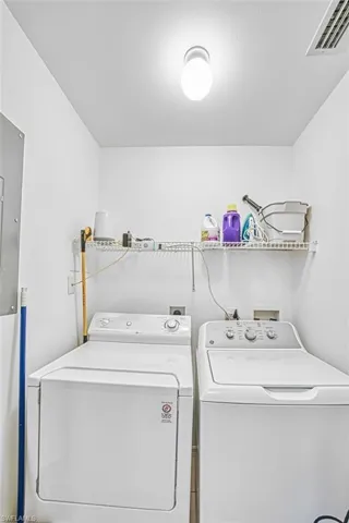 Laundry room with washer and dryer