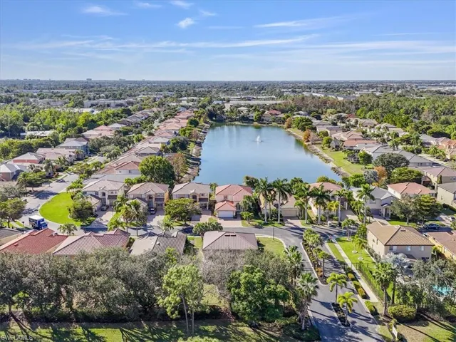 Aerial view of property's location featuring nearby suburban area