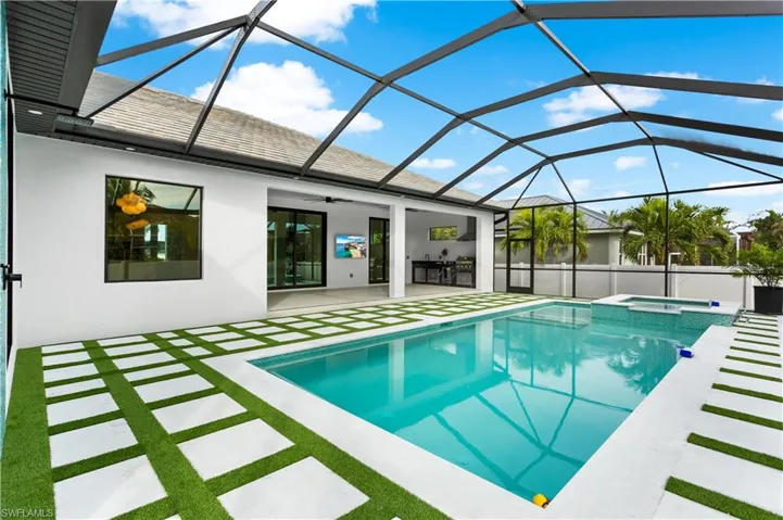 ARTIFICIAL GRASS, PAVED STONES & LUSHLY LANDSCAPED, FENCED YARD