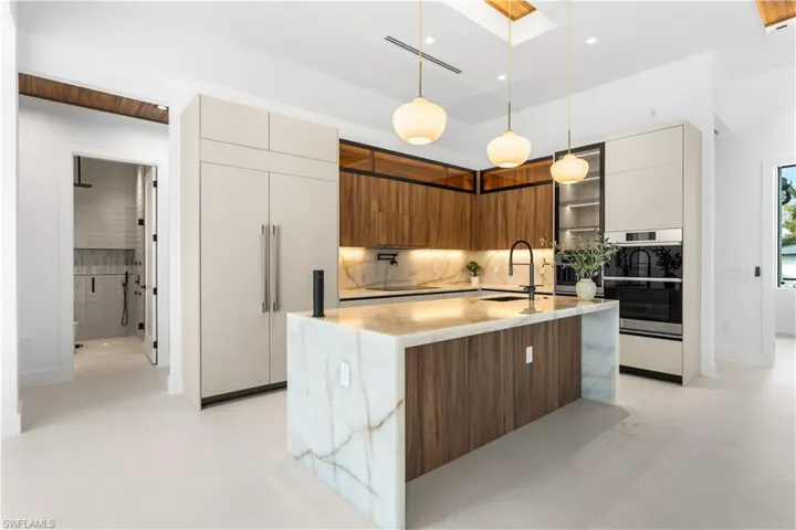 Custom top-of-the-line CABINETRY & under- & top-cabinet lighting & Designer's Lamps