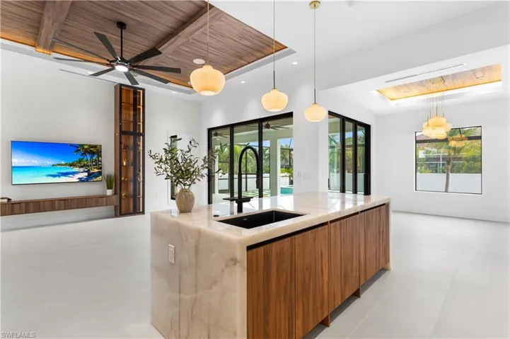 WATERFALL KITCHEN ISLAND, CRISTALLO QUARTZITE countertops & large sink w/ WATERFALL FAUCET add on