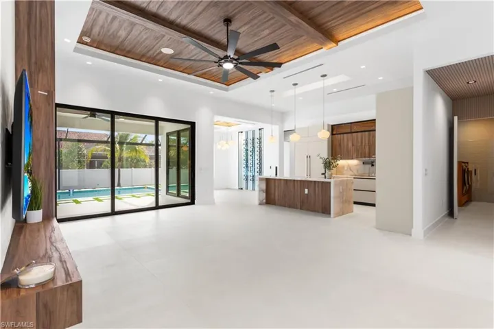 BRIGHT & OPEN LAYOUT features 48x48 SPANISH PORCELAIN TILE FLOORING throughout, MODERN & LUXURIOUS atmosphere!