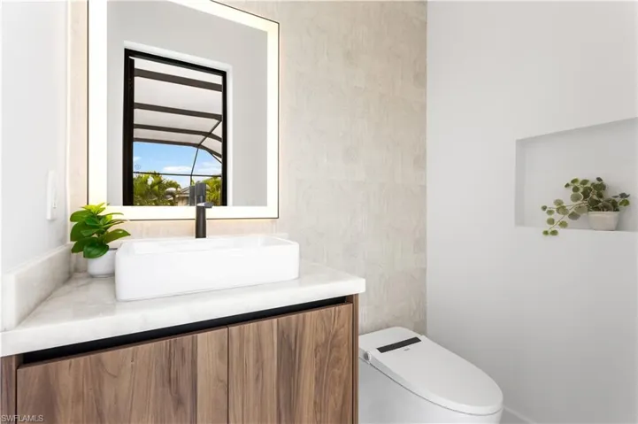A half pool bath offers added convenience and keeps your home tidy by providing easy outdoor access for guests and swimmers.