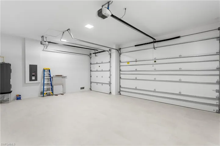 3-CAR GARAGE w/ INSULATED DOORS & CEILING enhances HOME ENERGY EFFICIENCY.