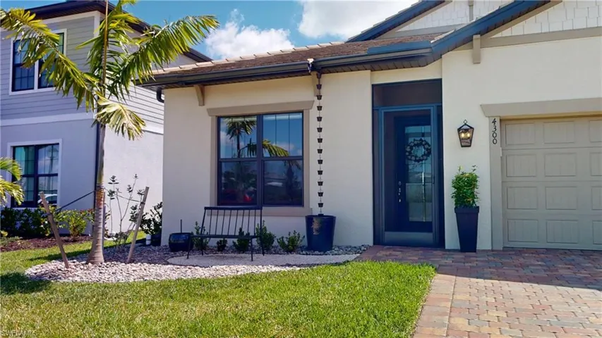 Custom Landscaped - Impact Windows & Doors - Screened Front Entry