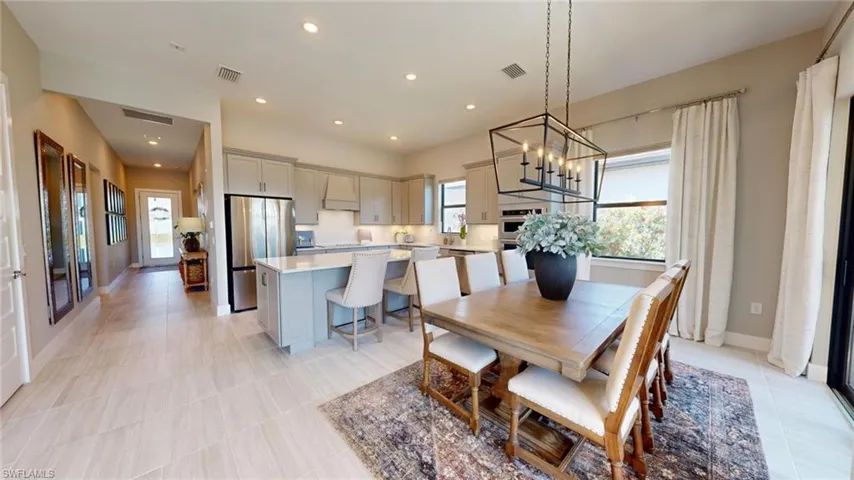 Plank Tile Flooring Throughout - Decorative Light Fixtures