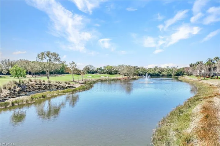 Water view featuring a tree filled landscape