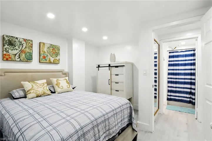 Bedroom with recessed lighting and light wood-type flooring
