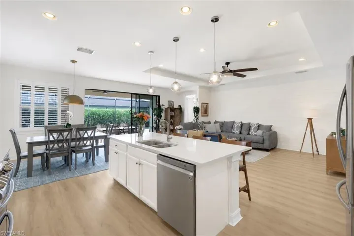 *Kitchen cabinets digitally painted white*
