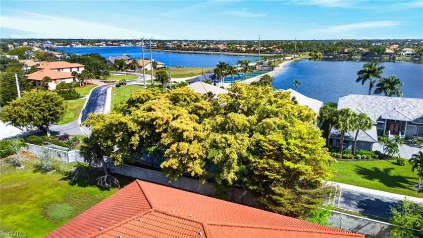 Expansive waterscape forming a backdrop to a residential setting