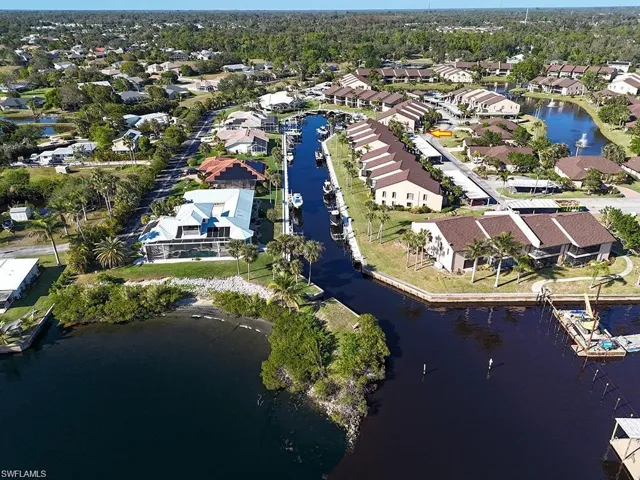 Bird's eye view featuring a water view and a residential view