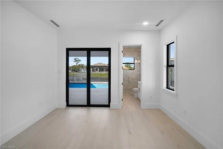 Spare room featuring light hardwood / wood-style floors