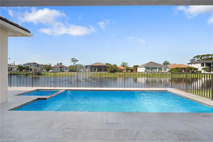 View of pool featuring a water view