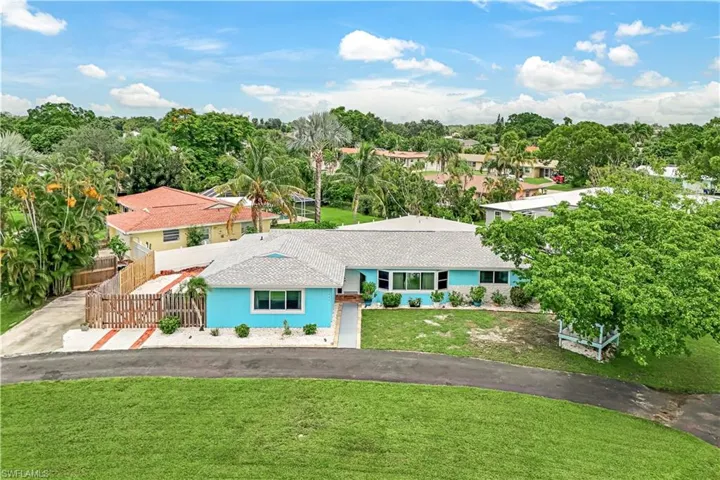 View of front of house with a front yard