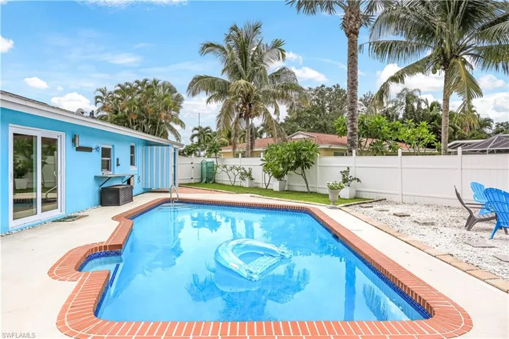 View of swimming pool with a patio