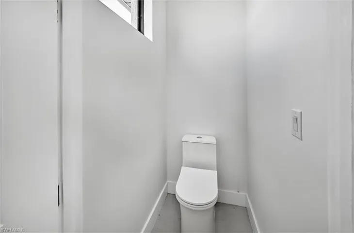 Modern white toilet with a contemporary design and a low-profile tank