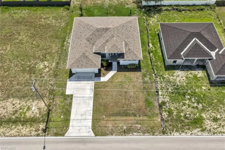 Contemporary single-story residence with a multi-gabled roofline and attached two-car garage