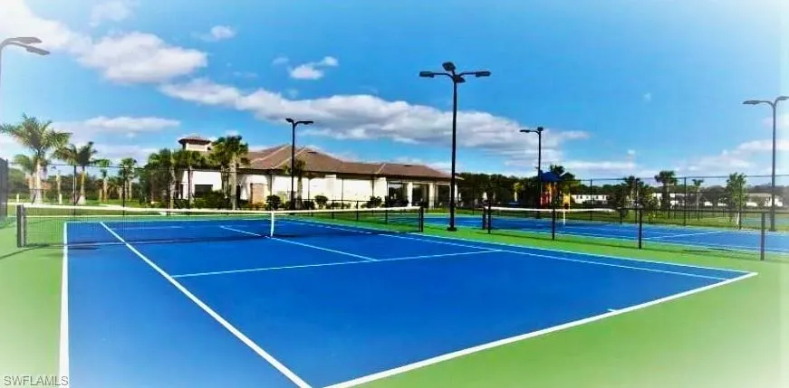 View of tennis court featuring community basketball court