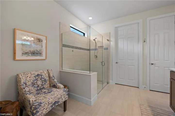 Bathroom featuring a shower with shower door