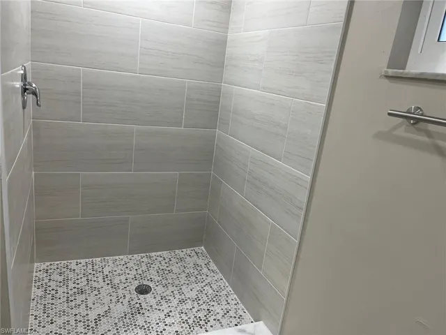 Primary Bathroom with Walk-In Tiled Shower
