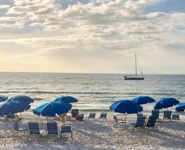 Pelican Bay Beach Umbrellas & Chairs