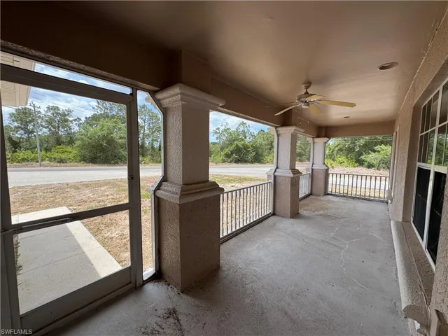 View of patio with a porch and ceiling fan