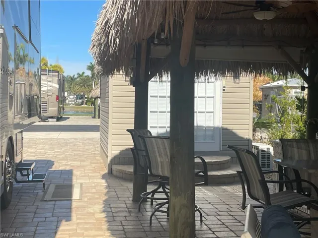 View of patio / terrace with a gazebo and ceiling fan