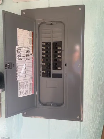 Utility room featuring electric panel