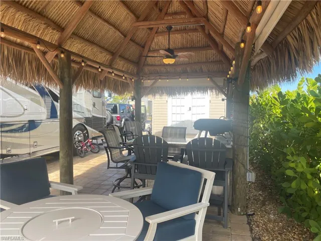 View of patio / terrace with a gazebo and ceiling fan