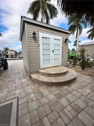 View of outbuilding with french doors