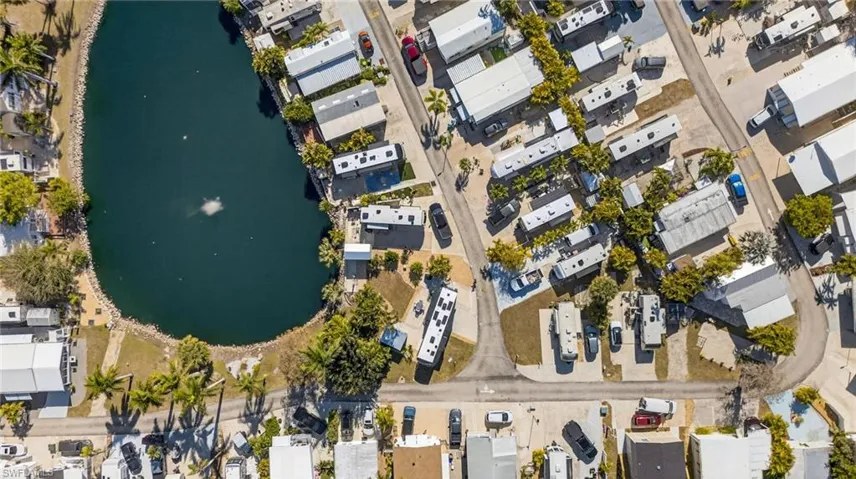 View of property location with a nearby body of water