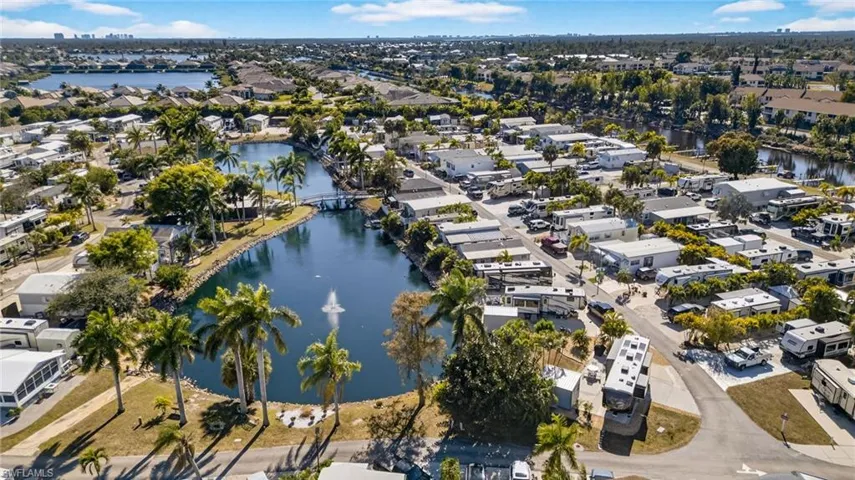 View of property location featuring nearby suburban area and a large body of water