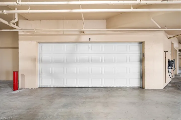 Large 2 car underbuilding enclosed garage.