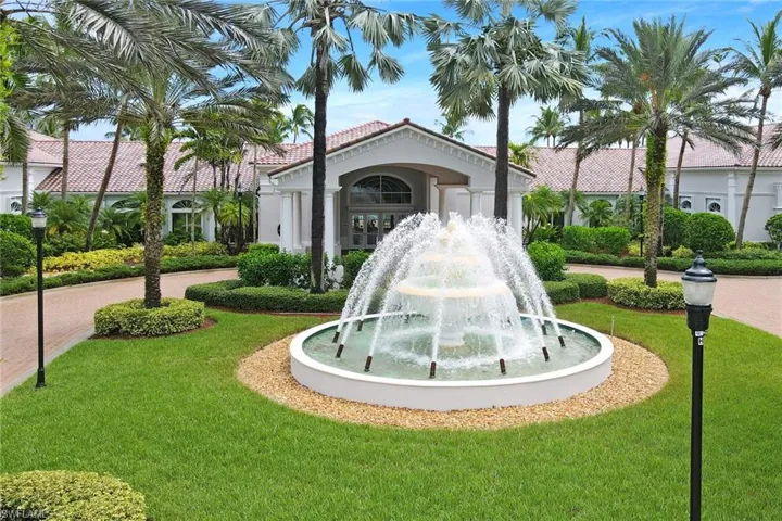View of property's community featuring a yard