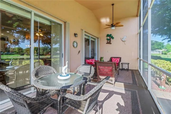 Sunroom / solarium featuring lofted ceiling and ceiling fan