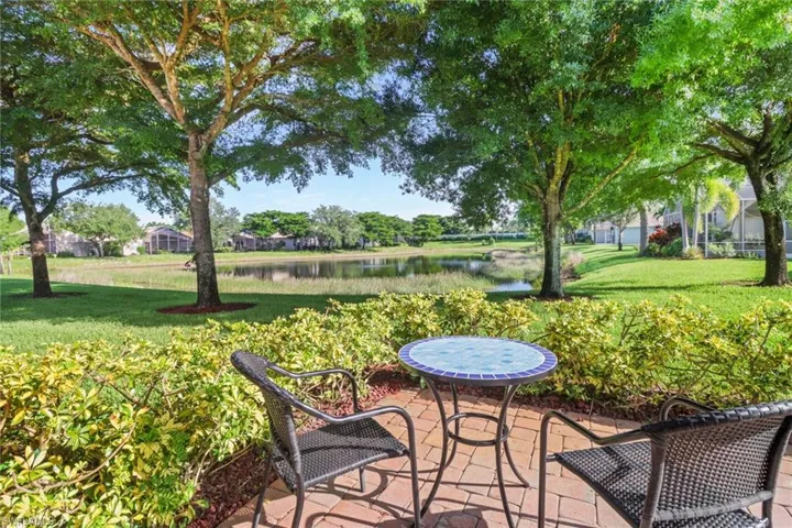 View of patio / terrace featuring a water view