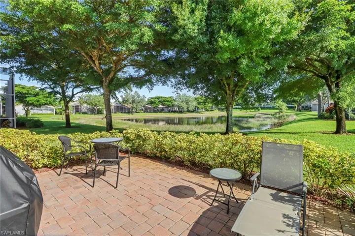 View of patio / terrace with a water view