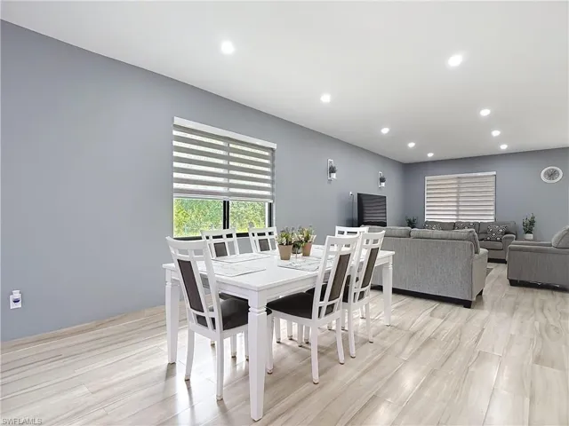 Dining room featuring recessed lighting and light wood-style flooring