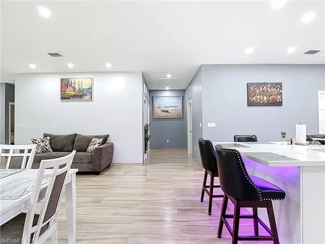 Dining room featuring recessed lighting and light wood-style floors