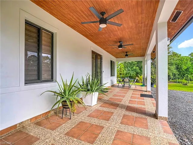 View of patio / terrace featuring ceiling fan