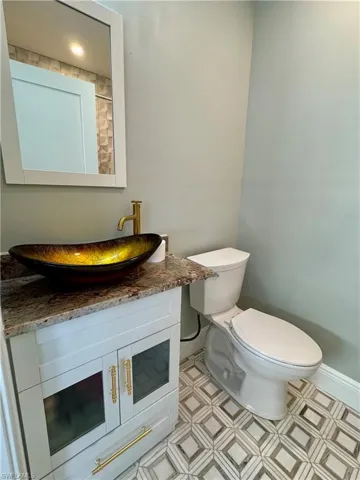 Bathroom with vanity and toilet