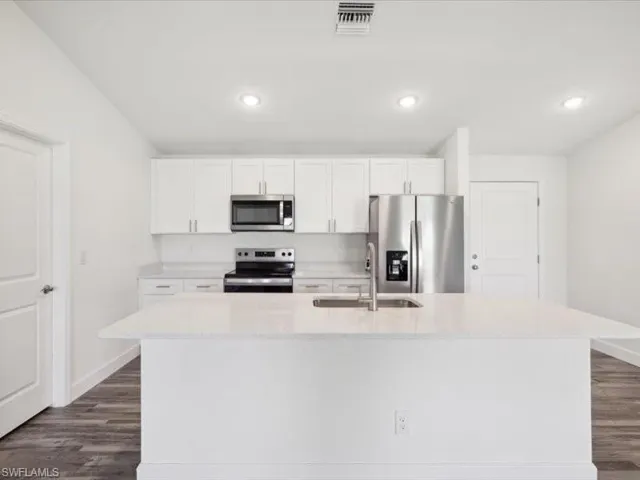 609 NW 10th  TER, Cape Coral, FL 33993
